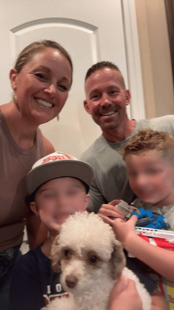 Ashley's family smiling happily