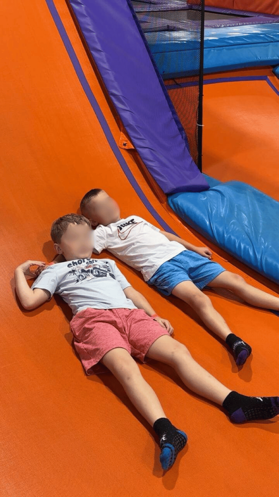Ashley's children bonding on trampoline play area