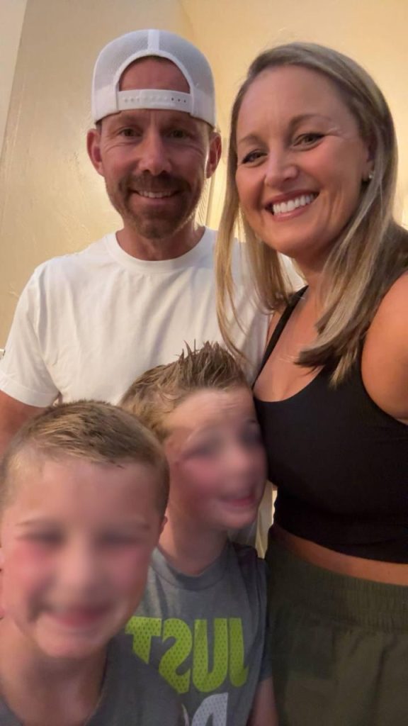 Happy Christian family smiling together indoors